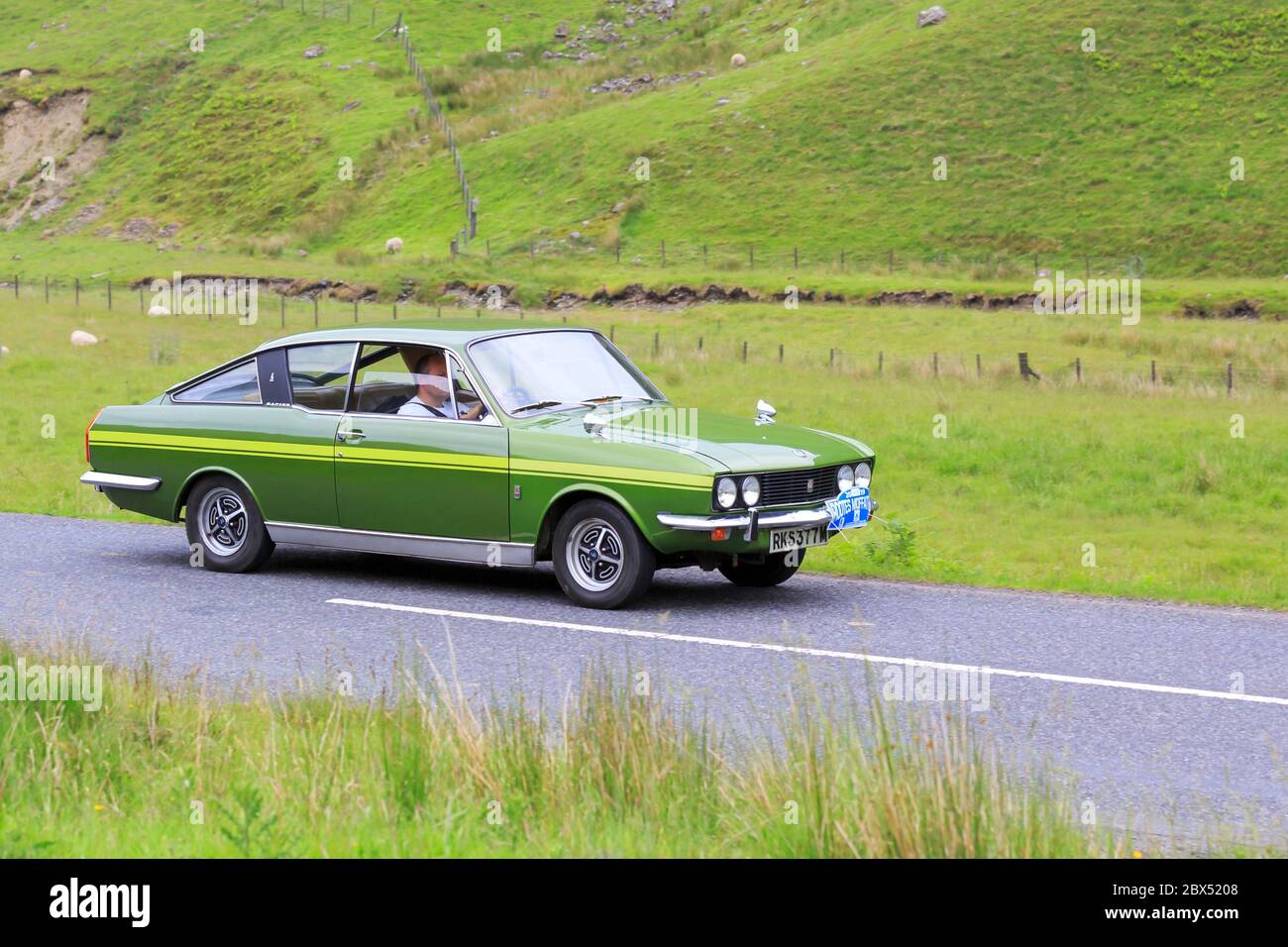 MOFFAT, SCOTLAND - JUNE 29, 2019: 1973 Sunbeam Rapier H120 car in a classic car rally en route towards the town of Moffat, Dumfries and Galloway Stock Photo