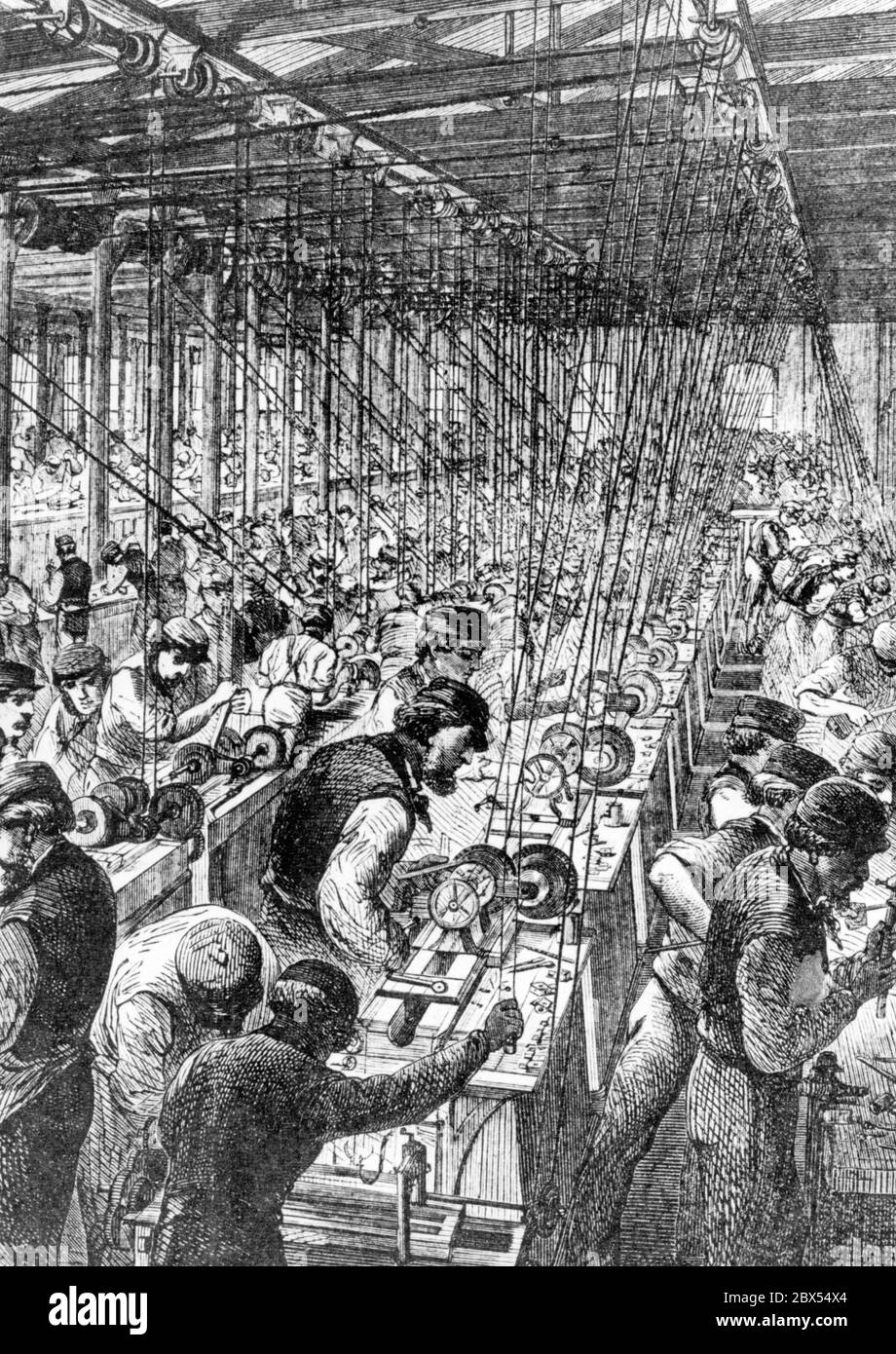 Workers at the workbenches of a metalworking company Stock Photo Alamy