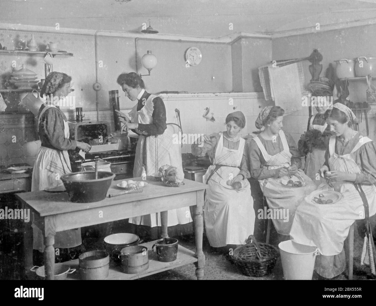 A modern school at that time for future housewives. Here they learn how to cook. Stock Photo