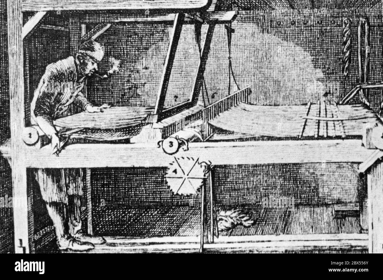 The illustration from 1774 shows a weaver at work at his then modern loom. Stock Photo