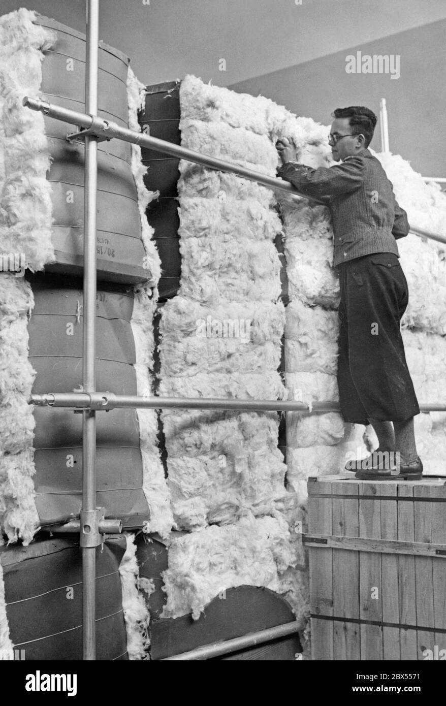 The picture from March 23, 1937 shows many bales of raw wool. These were to be processed in front of spectators at the Textile Exhibition in the exhibition halls on Kaiserdamm (today: Messe Berlin). Stock Photo