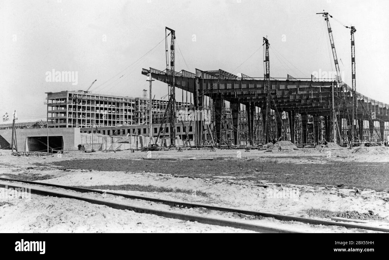 Several new buildings were constructed at the Tempelhof field, the topping-out ceremony of which was celebrated in May 1937. Stock Photo
