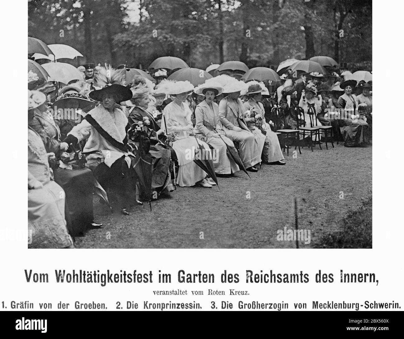 The charity festival organized by the Red Cross. In the front row, third from the left: Countess Selma von der Groeben, Crown Princess Cecilie of Mecklenburg and Anastasia Mikhailovna, Grand Duchess of Mecklenburg. Stock Photo