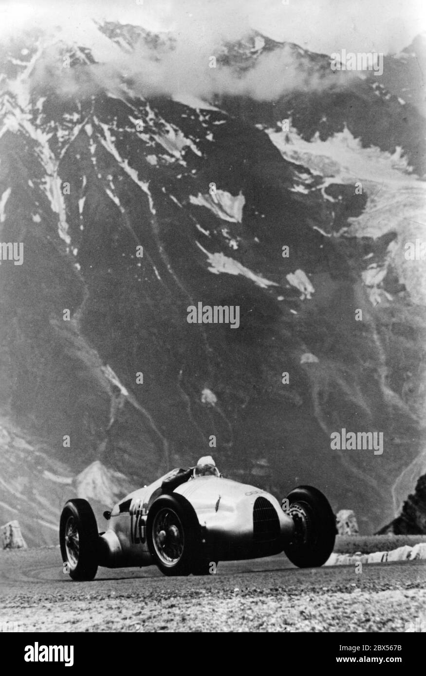 Race car at the final training for the Deutsche Bergmeisterschaft (German Mountain Championship) on the Grossglockner High Alpine Road. Stock Photo