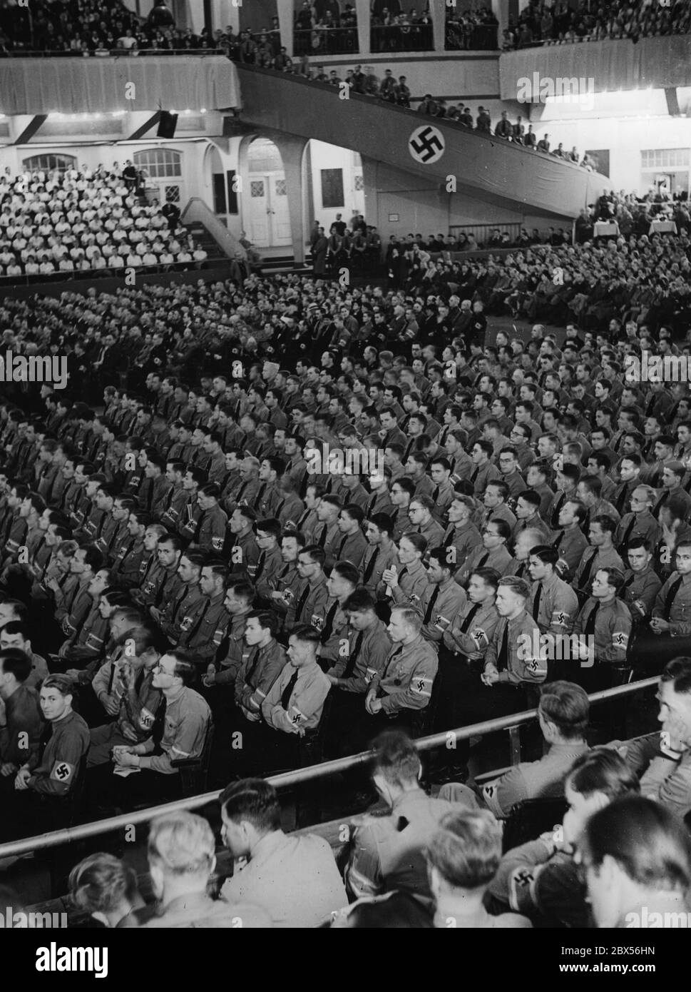 View of a large rally at the Berlin Sportpalast during Joseph Goebbels' speech at the end of the Berlin Student Day. Stock Photo