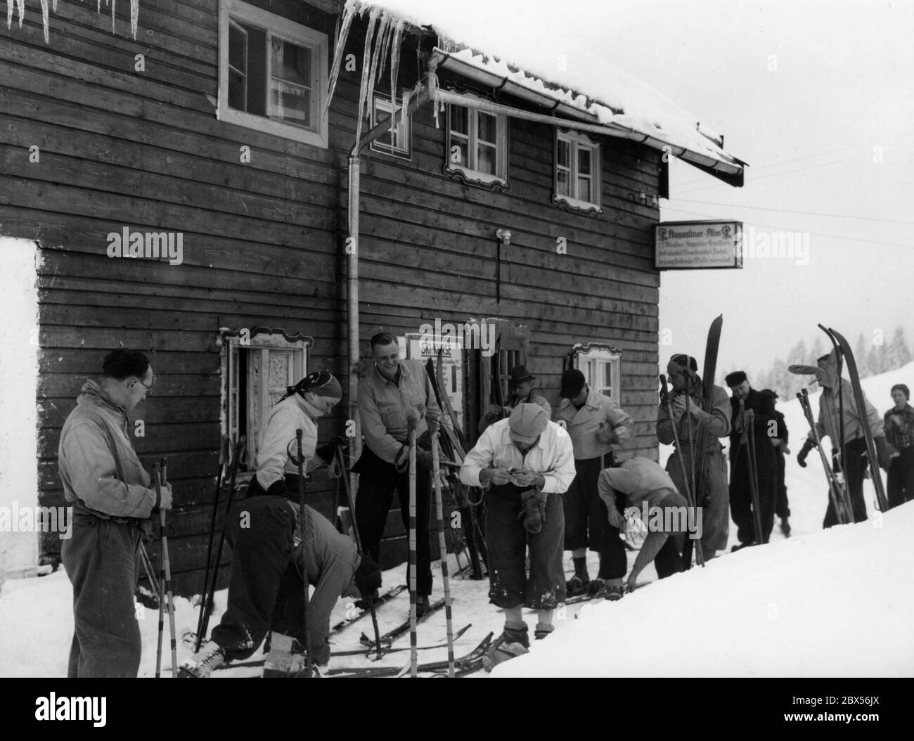 German and French students leave from the Augustiner-Alm at Winklmoos for a ski tour. Stock Photo