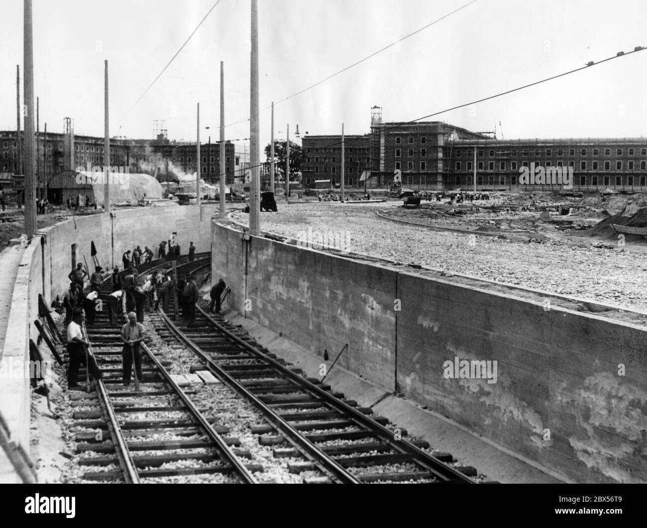 View of the construction work for the laying of the tram tracks under the ground in Allersberger Strasse and Bayernstrasse. This is being carried out so that the tram is not disturbed in its operation by the marching columns of the SS Barracks and the crowds attending the rallies which take place on the neighbouring Nazi Party Rally Grounds. Stock Photo
