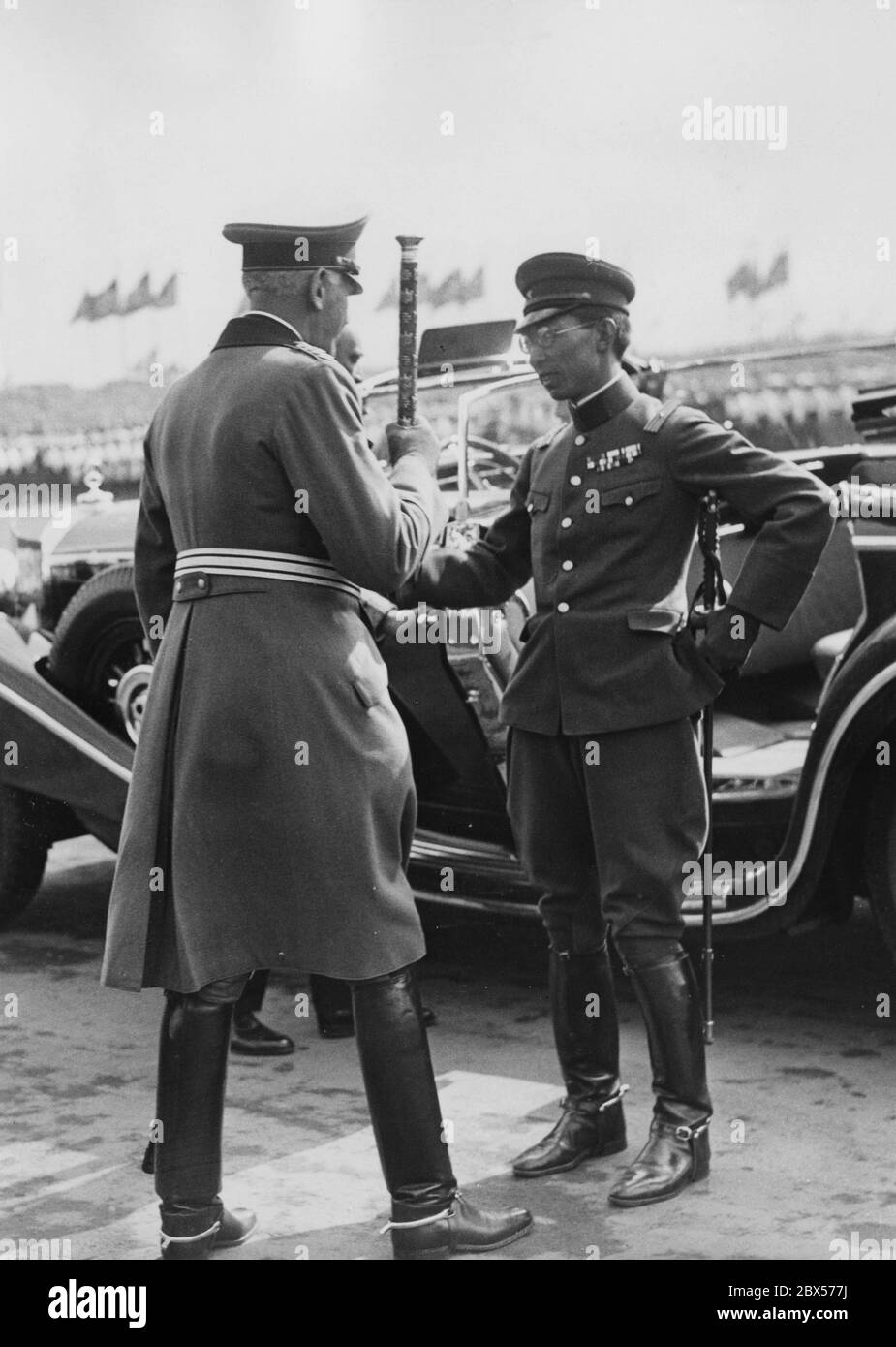Field Marshal Werner von Blomberg welcomes Prince Chichibu Yasuhito, brother of the Emperor of Japan and General of the Japanese Army, as guest on the Day of the Wehrmacht during the Reich Party Conference of Labor in Nuremberg. Stock Photo