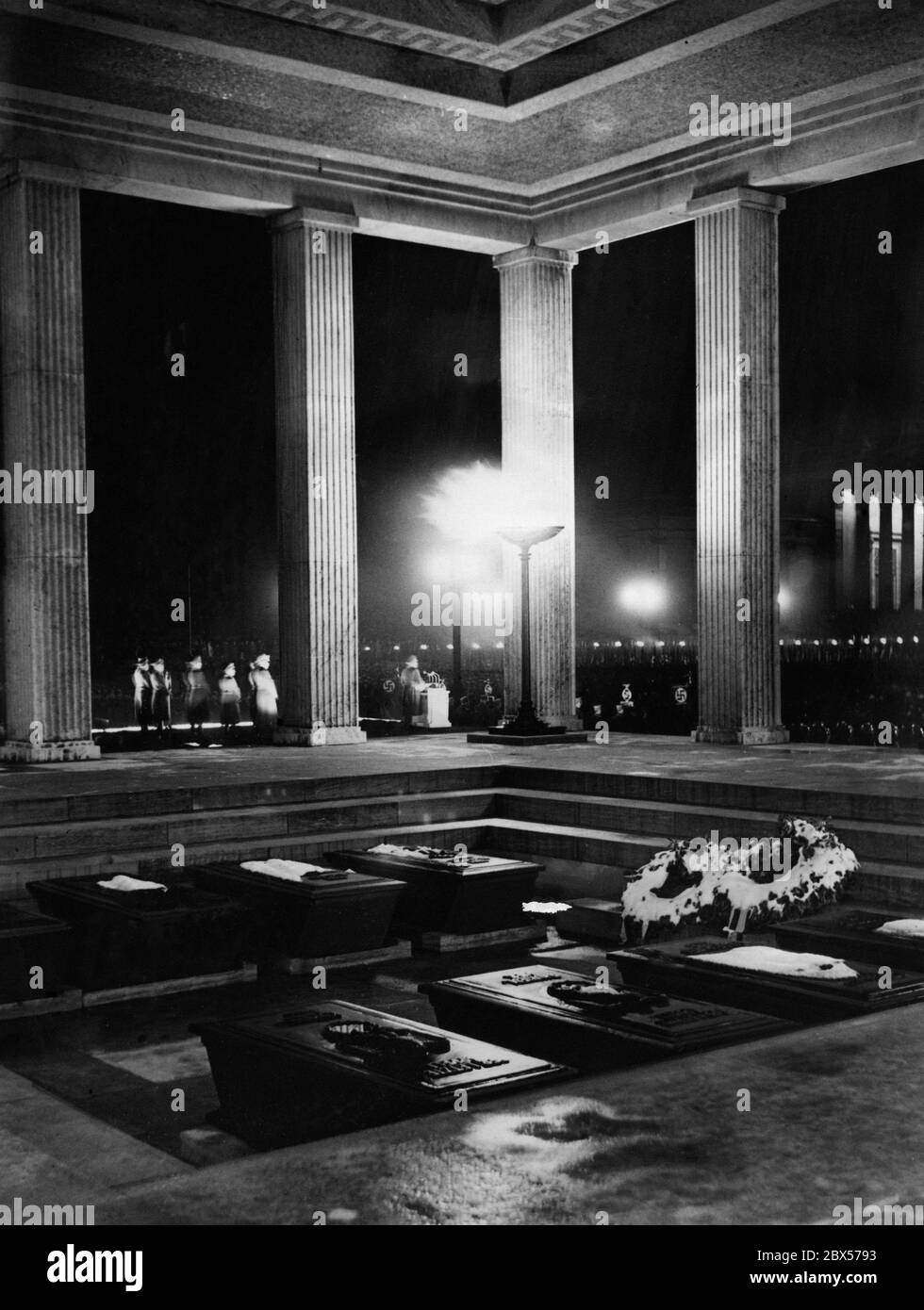 Swearing-in of political leaders by Rudolf Hess on the Koenigsplatz in Munich (in the background). In front the Ehrentempel ('Temples of Honor') of the National Socialists killed in the 1923 Beer Hall Putsch. Stock Photo