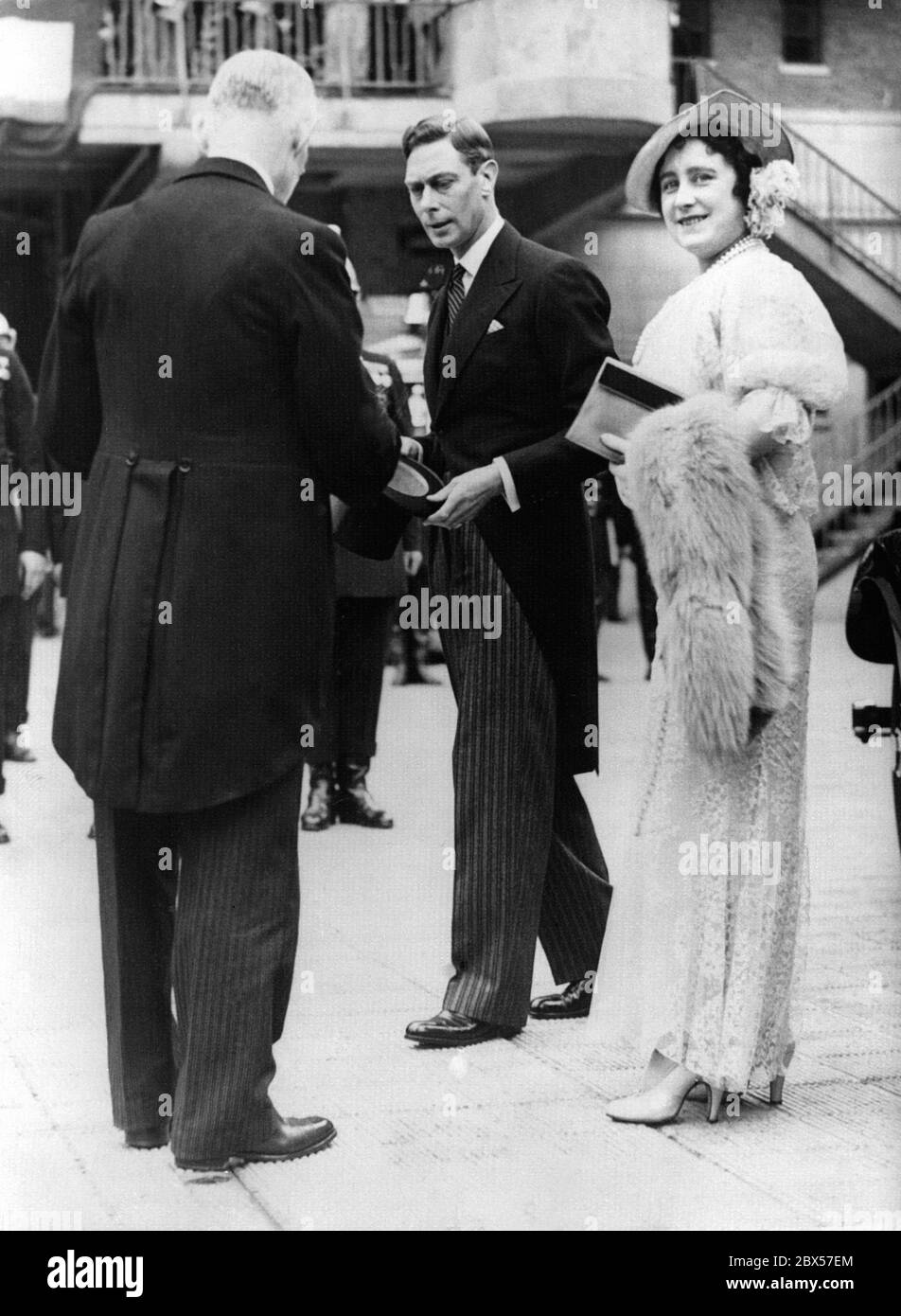 King George VI and Queen Elizabeth arriving at the new headquarters of the London Fire Brigade for the inauguration of the new building at Albert Embankment near Lambeth Bridge. The new building is a steel structure, with nine stories and seven fire station entrances. Stock Photo