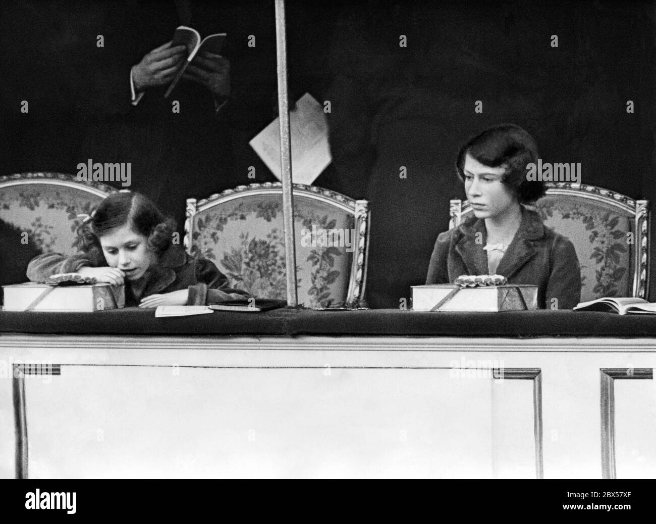 Elizabeth II and her sister Princess Margaret Rose (left) are attending the National Pony Show at the Royal Agriculture Hall in Islington, London. Stock Photo