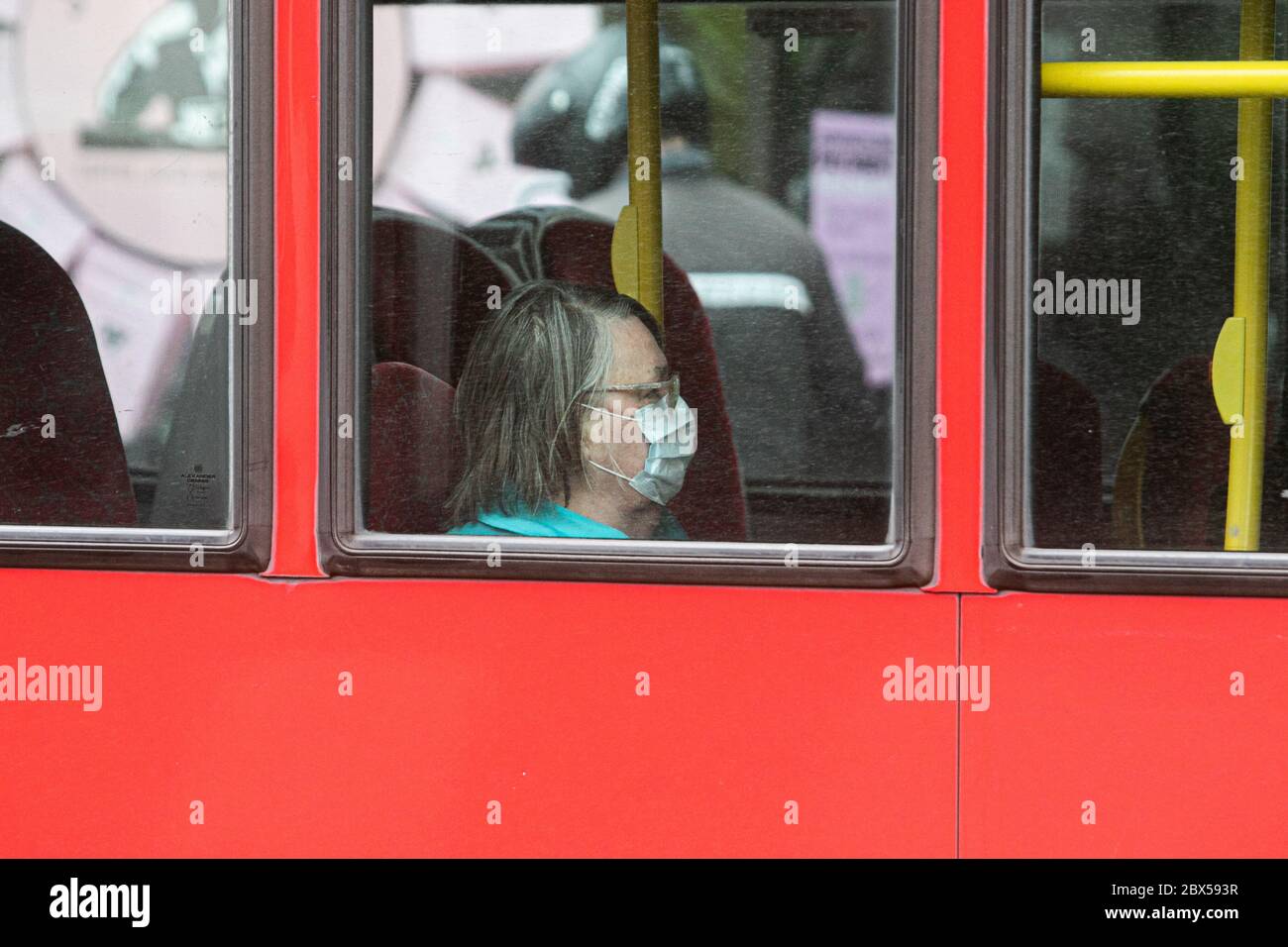 WIMBLEDON LONDON, UK. 5 June 2020. A passenger wearing a protective