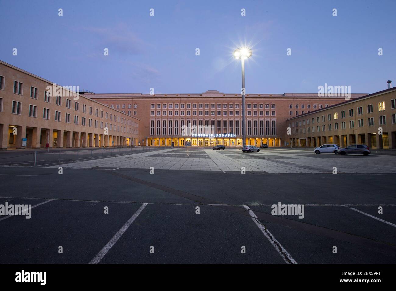 Berlin, Germany. 03rd Apr, 2020. The main entrance of the former central airport Berlin-Tempelhof during the blue hour. The airport was in operation from 1923 until its closure on 30 October 2008. Credit: Georg Wenzel/dpa-Zentralbild/ZB/dpa/Alamy Live News Stock Photo