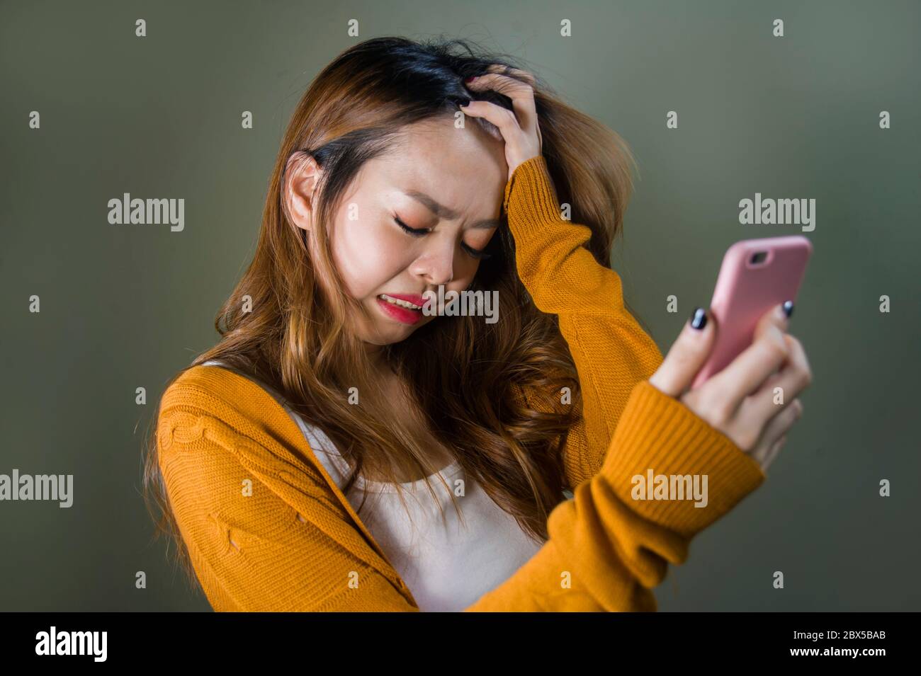 young cute and sad Asian Korean girl feeling broken heart and desperate ...