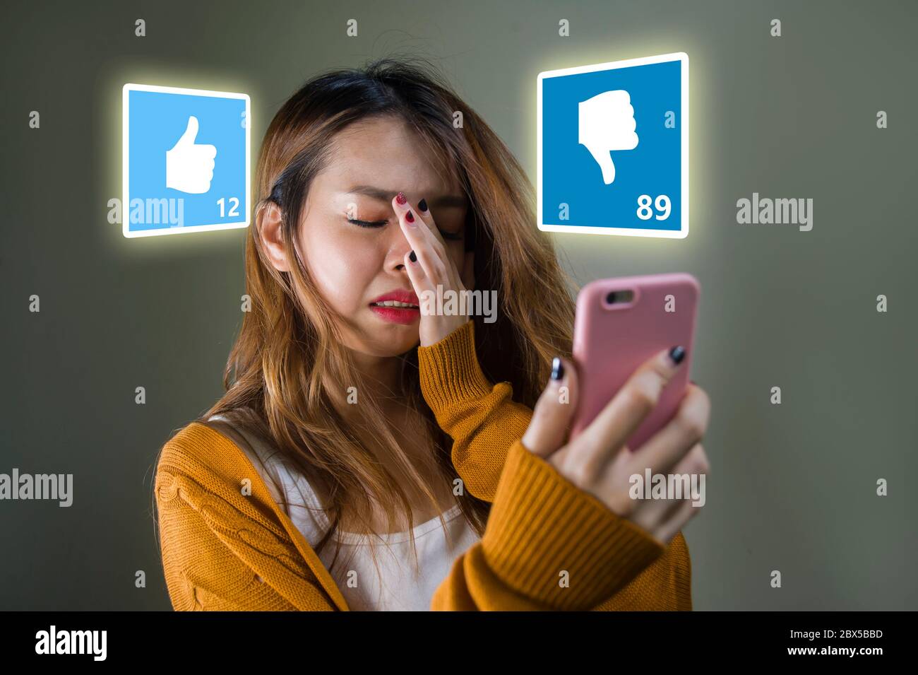 young cute and sad Asian Korean girl feeling unhappy and desperate ...