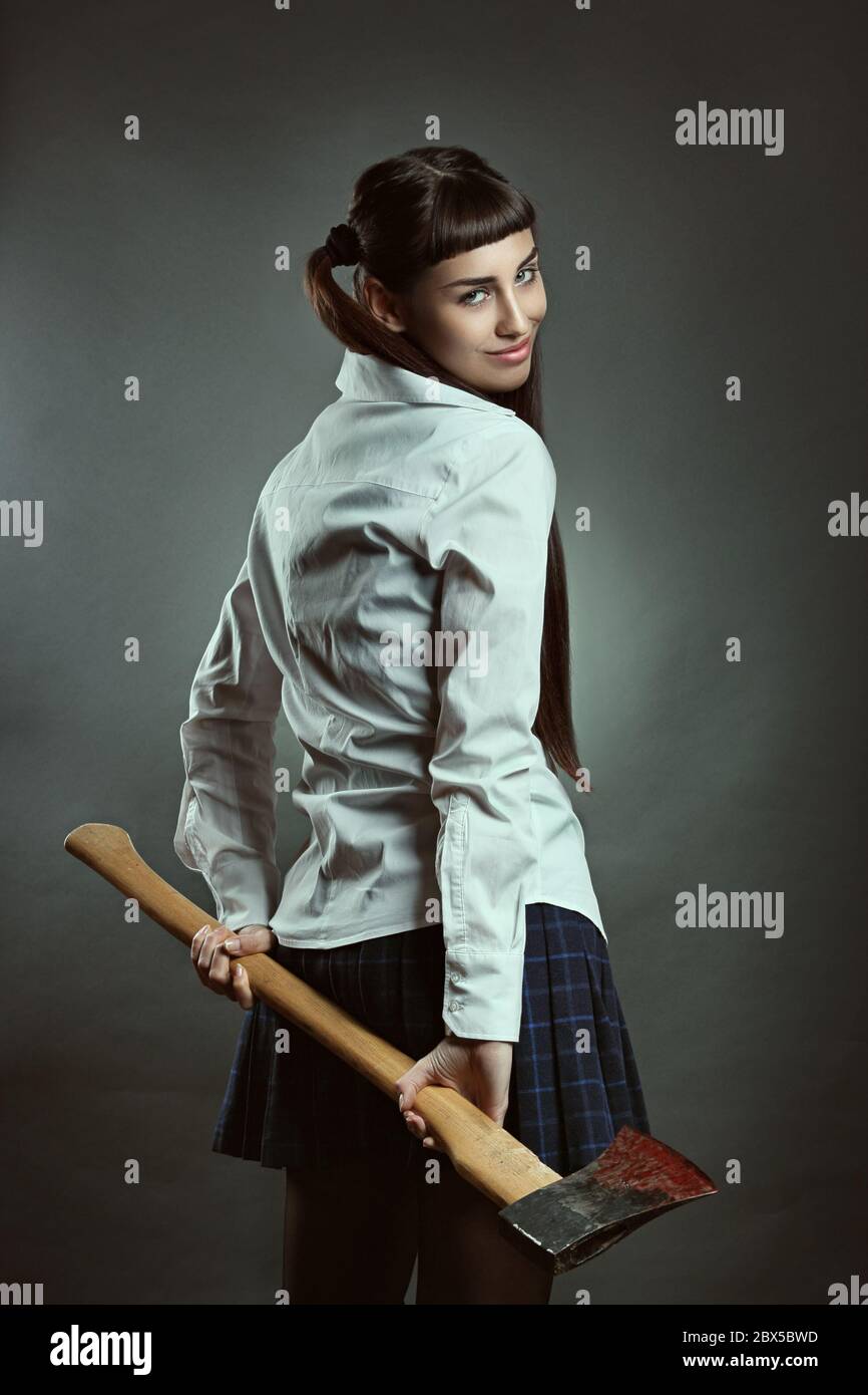 Beautiful psycho girl with smiling expression. Funny and criminal Stock  Photo - Alamy