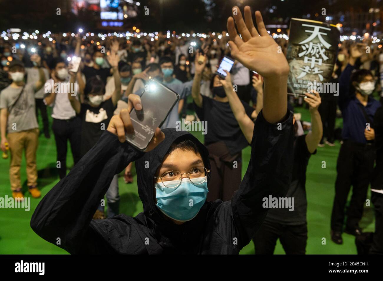 A man gestures during the Tiananmen Square vigil remembrance at