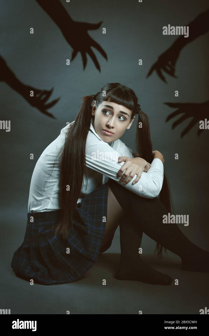 Young woman alone with her fears and doubts Stock Photo