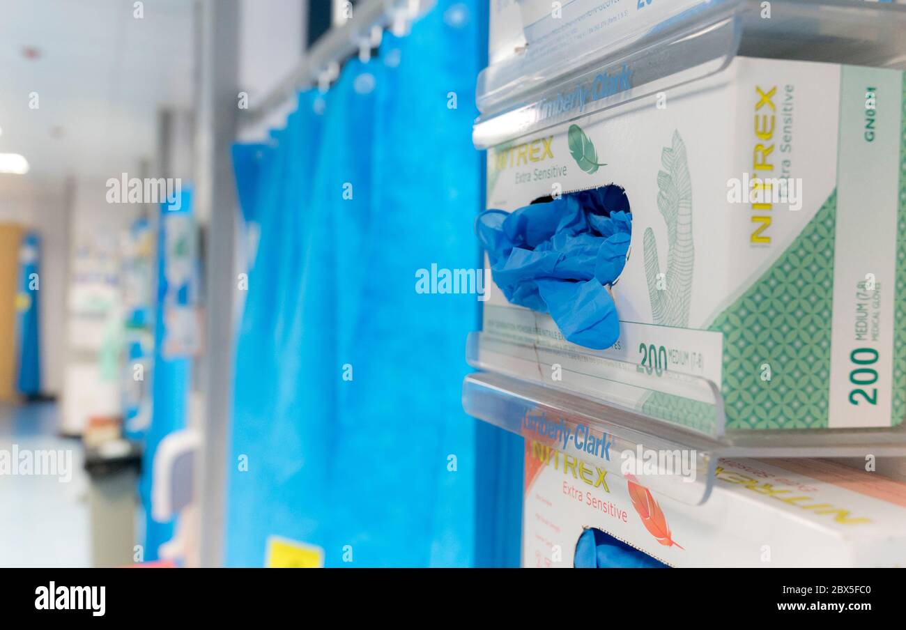 Boxes of nitrex gloves and cubicle curtains on a UK hospital ward Stock  Photo - Alamy