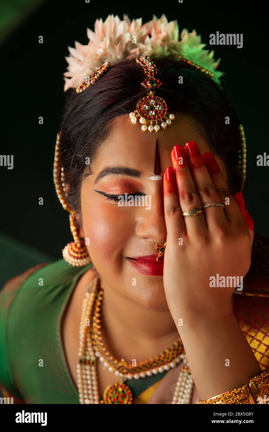 Bharatnatyam dancer giving a graceful performance Stock Photo Alamy