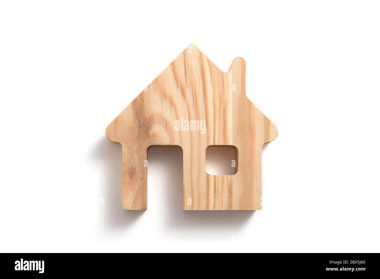 Wooden house shape on white background with clipping path Stock Photo