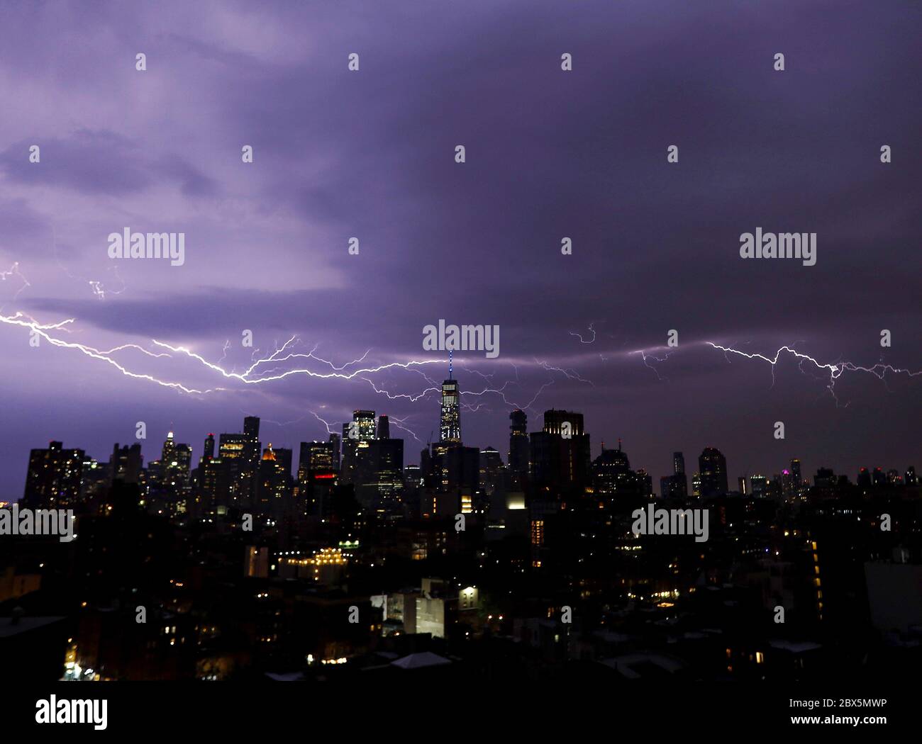 New York, United States. 05th June, 2020. Lightning crosses the skyline ...