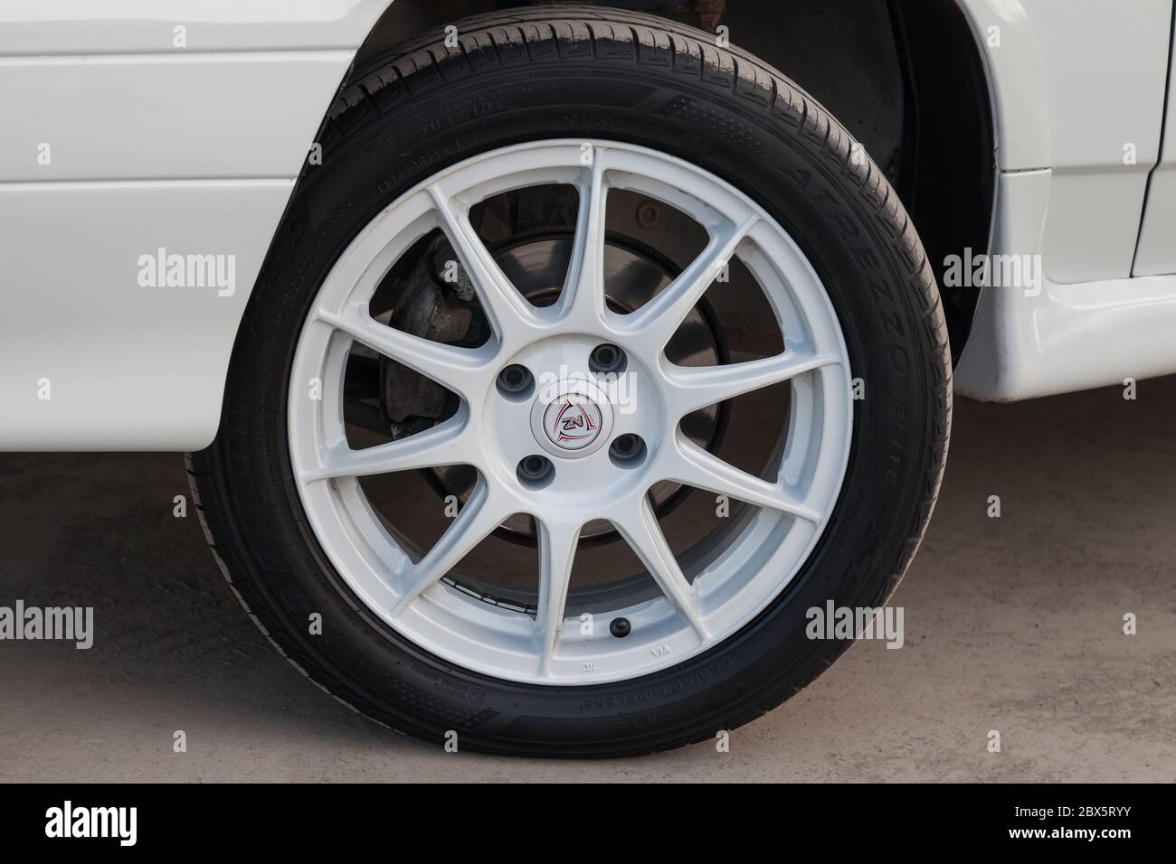 Novosibirsk, Russia - 05.20.2020: Close-up of a wheel of a modern Russian VAZ car of the LADA concern group with a summer tire and a white disc on a s Stock Photo
