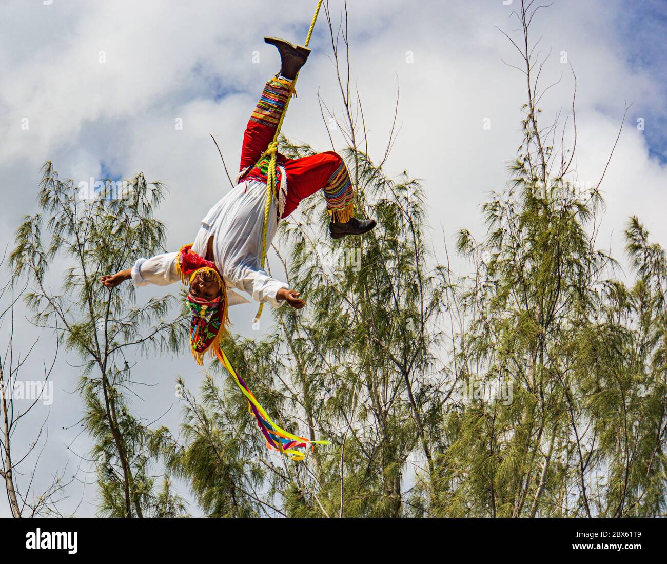 Tulum, Quintana Roo, Mexico- February 23,2020: The Flying Men from Papantla,Veracruz, Mexico performing in Tulum Stock Photo