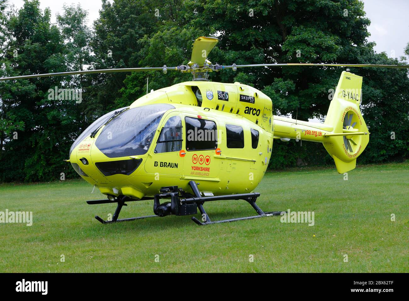 The Yorkshire Air Ambulance Airbus H145 helicopter tail number G-YAAC, landed at Swillington after reports of a man falling from a roof. Stock Photo