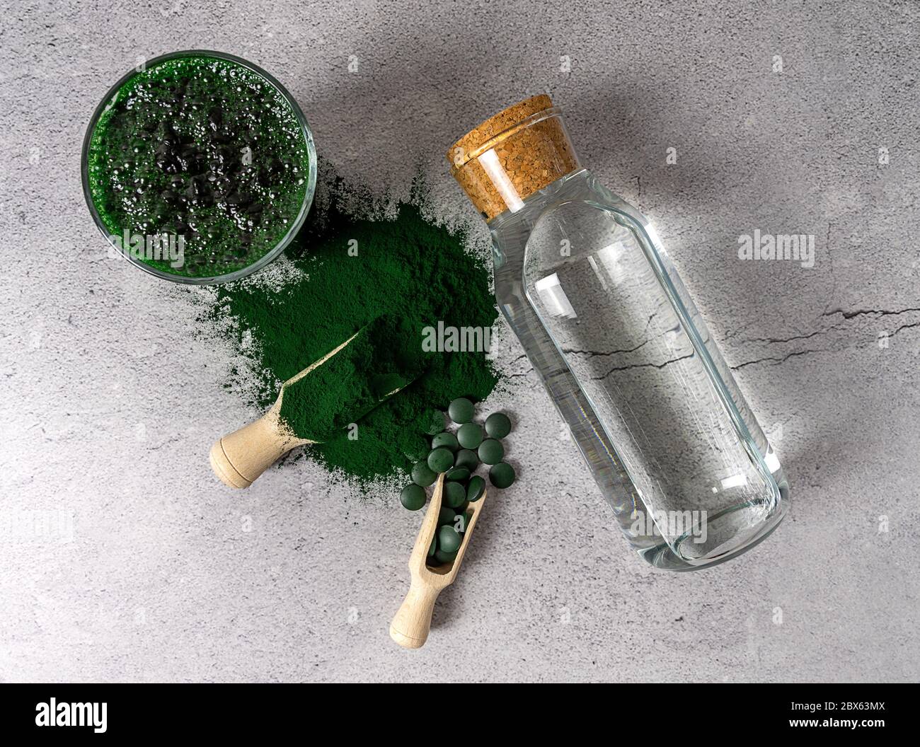 Detox concept. Making spirulina drink Stock Photo Alamy
