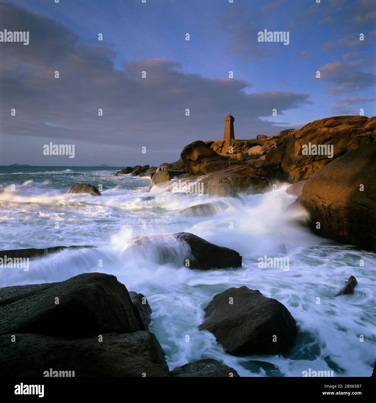 Lighthouse above stormy sea on the Pink Granite Coast, Ploumanac`h ...
