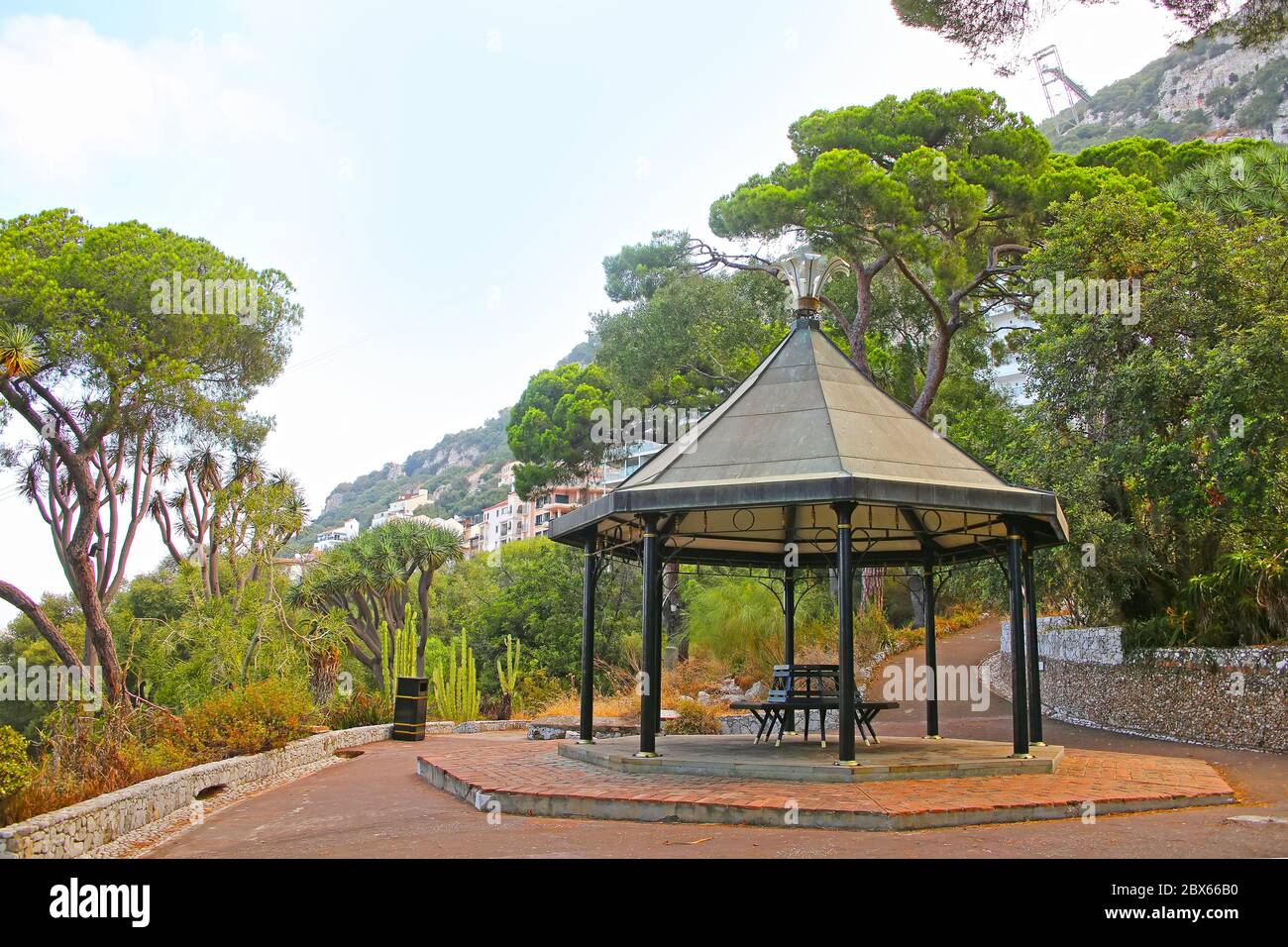 Pagoda the park with Canary Islands Dragon Tree & other plants inside the La Alameda botanical Gardens, Gibraltar, British overseas territory. Stock Photo