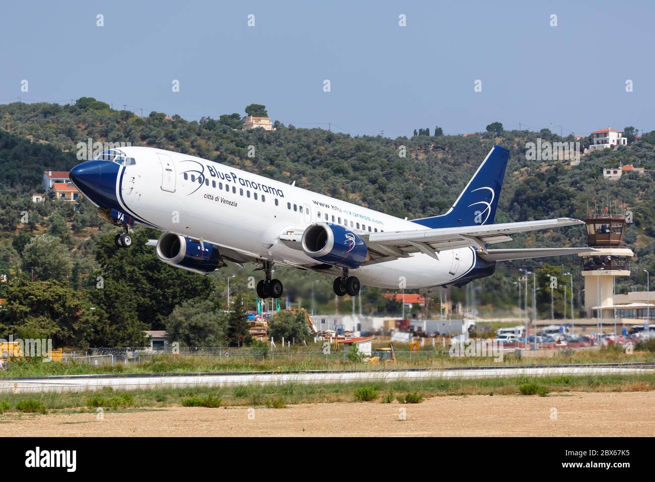 Skiathos, Greece - August 2, 2019: Blue Panorama Boeing 737-400 airplane at Skiathos airport (JSI) in Greece. Boeing is an American aircraft manufactu Stock Photo