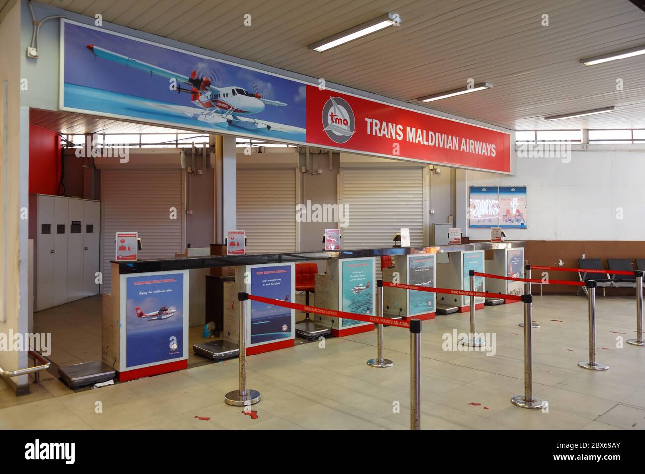 Male, Maldives - February 20, 2018: Check-in counters of TMA - Trans Maldivian Airways on Male airport (MLE) on the Maldives. Stock Photo