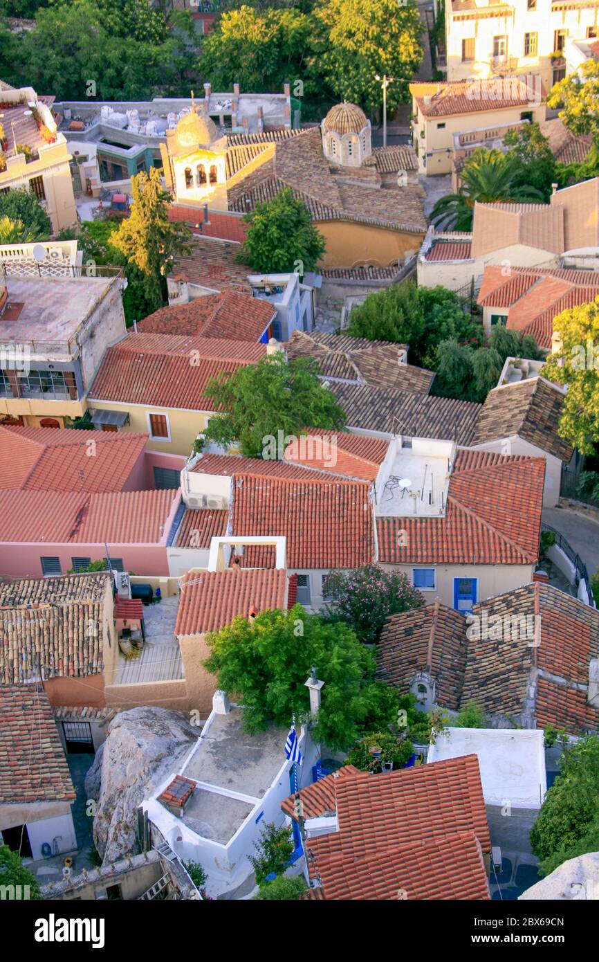 Houses and narrow streets in Plaka, almost no tourists, Athens, Greece. Plaka is an area situated at the foothill of Acropolis temples in Athens Stock Photo