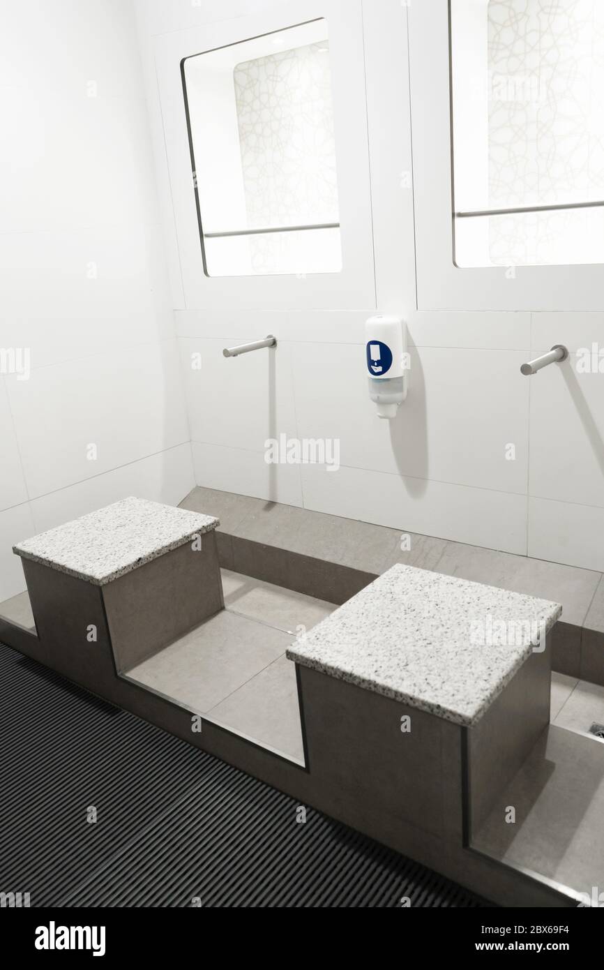 Stylish touchless washstand in a public toilet Stock Photo