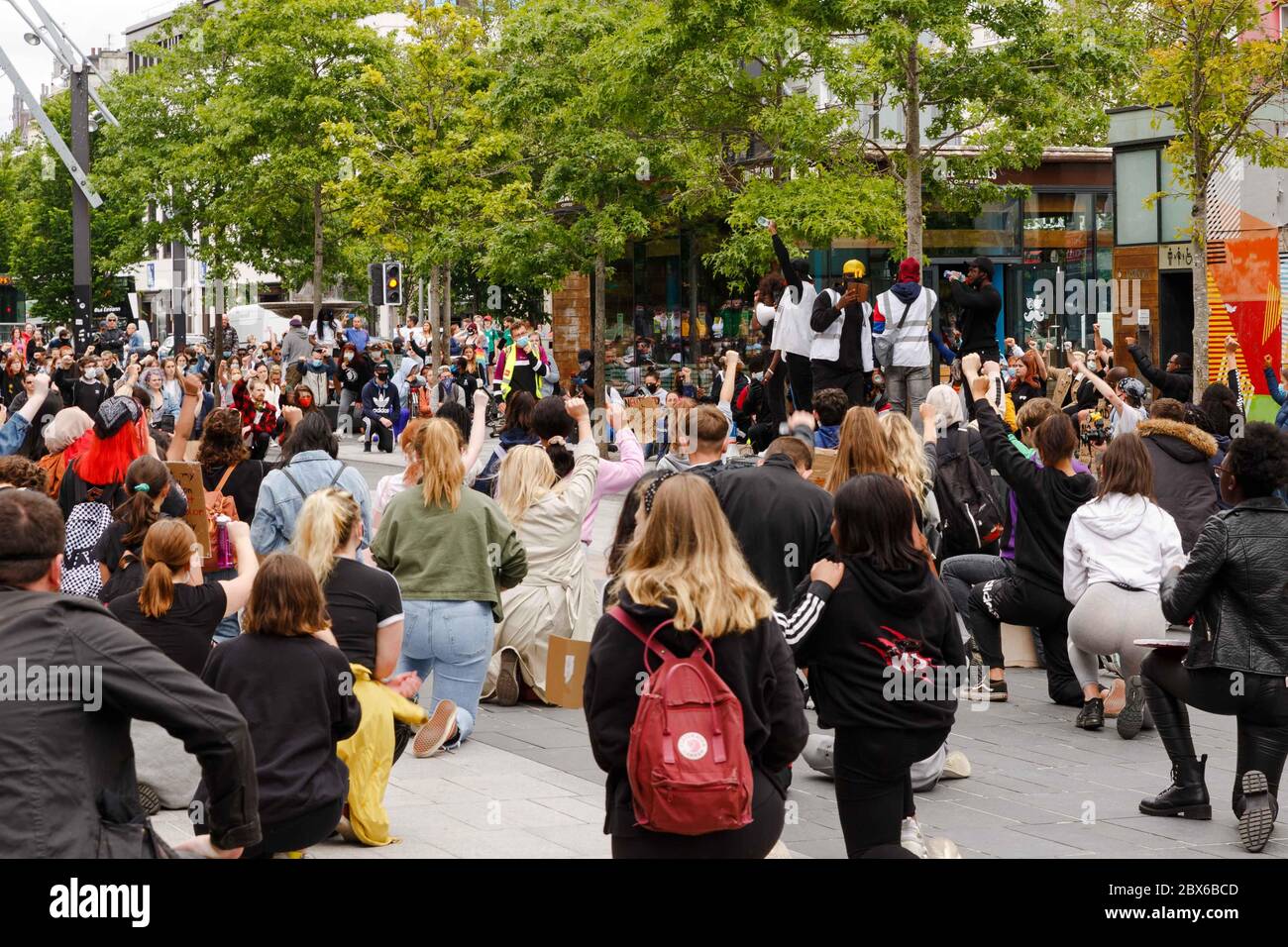 Cork, Ireland, 5th June 2020. Black Lives Matter Protest, Cork City. Despite being cancelled by organiser todays Black Lives Matter protest went ahead as planned. The protesters met at 2pm at Kent Station and it was made clear that social distancing guidlines were to be kept in mind at all times, this was helped by the attendance of saftey stewards and An Garda Siochana, they departed Kent Station and made their way to Cork City Libary where the protesters assembled and held an 8 minute moment of silence in memory of George Floyd whos death triggered the worldwide protests. Stock Photo