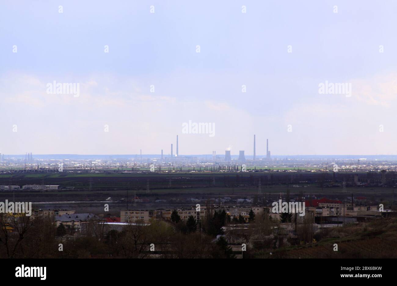 Industrial oil rafinery city seen from distance, in Ploiesti, Romania Stock Photo