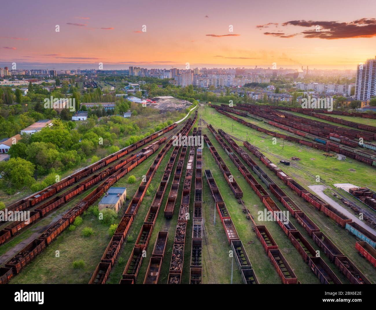 Aerial view of freight trains at sunset. Top view Stock Photo