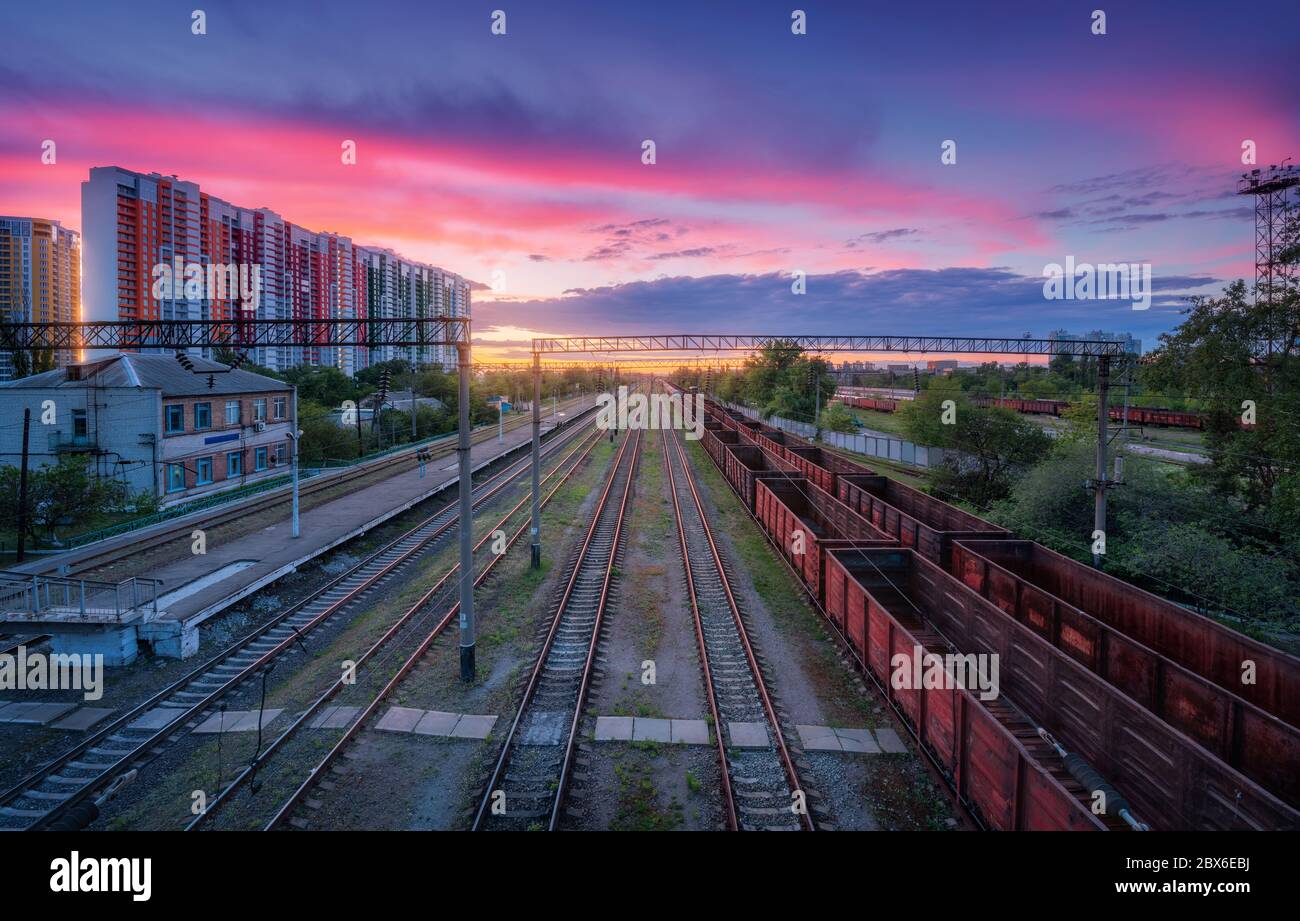 Aerial view of freight trains at sunset. Top view of railroad Stock Photo