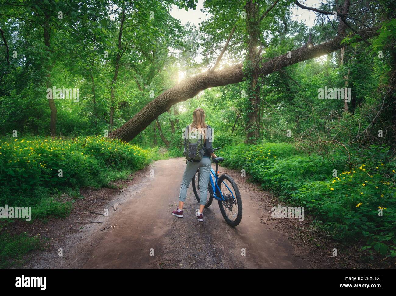 Girl riding bicycle backpack hires stock photography and images Alamy