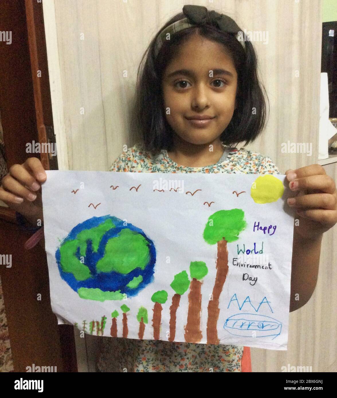 Kathmandu Nepal 5th June rya Parajuli A Nepali School Student Holds Her Prepared Art In Celebration Of World Environment Day At Her Home In Kathmandu Capital Of Nepal On June 5
