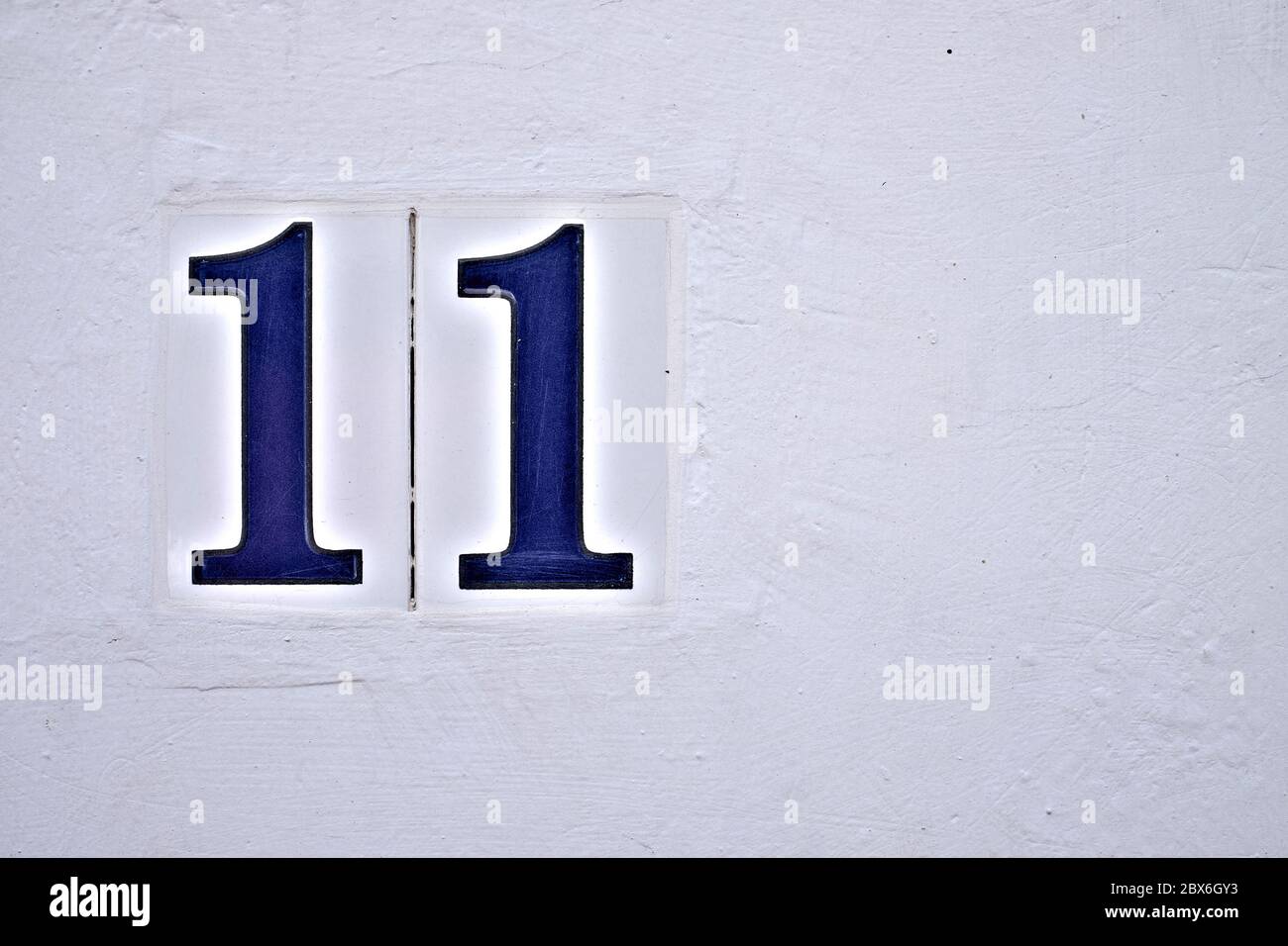 11, number eleven, decorative numeral on white surface. Stock Photo