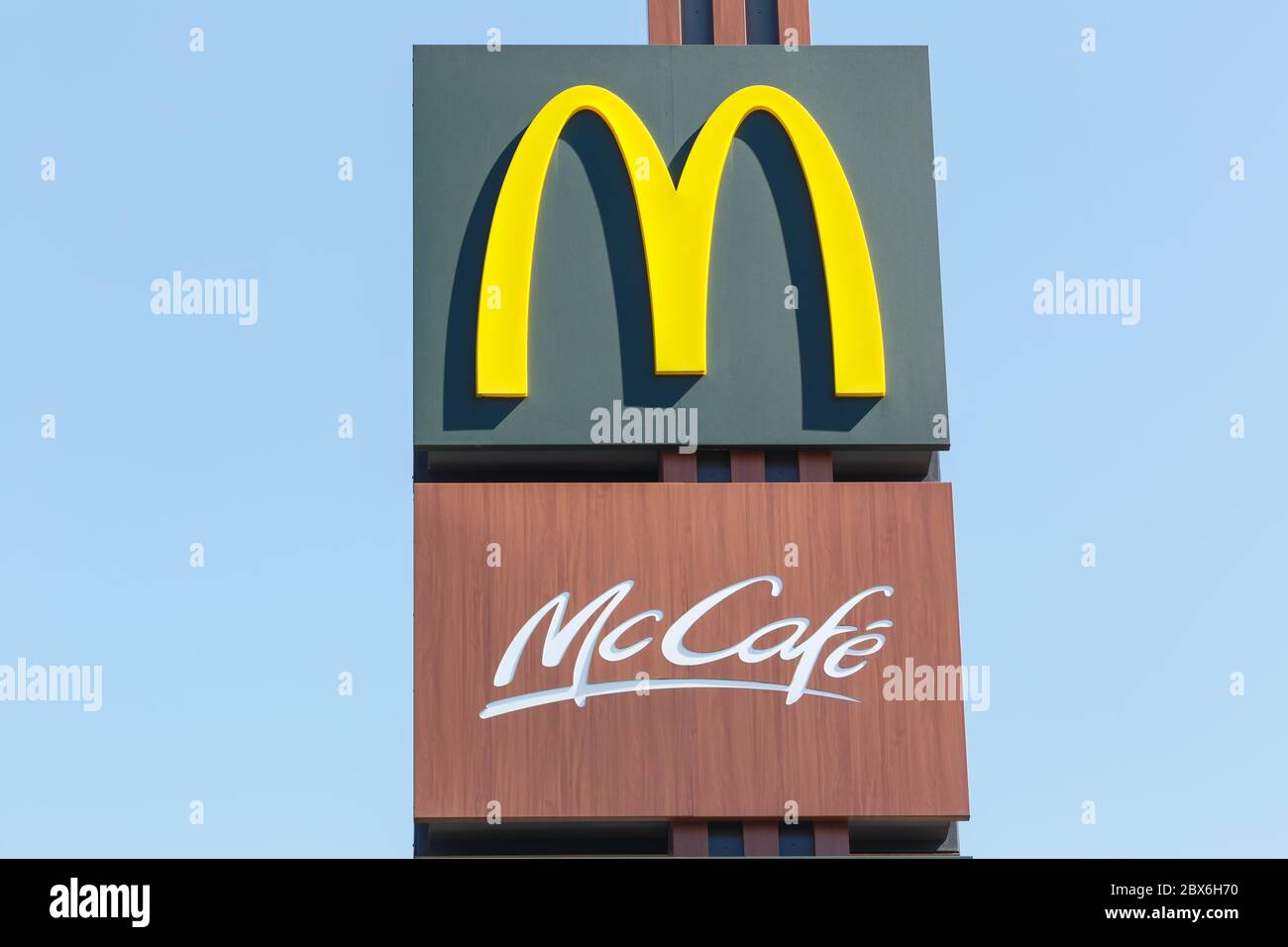 Stuttgart, Germany - April 22, 2020: McDonalds Logo sign McDonald's McCafe Cafe Restaurant Mc Donald's Mc Donalds Stuttgart in Germany. Stock Photo