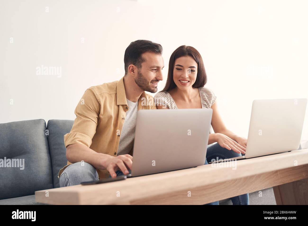 One man helping another man hi-res stock photography and images - Alamy