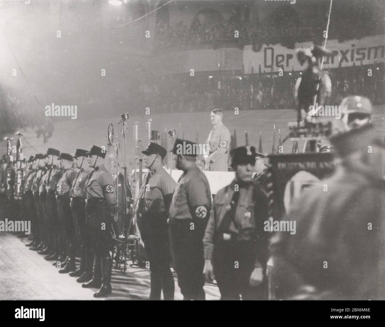 Hitler speaking at the Sportpalast. Heinrich Hoffmann Photographs 1933 Adolf Hitler's official photographer, and a Nazi politician and publisher, who was a member of Hitler's intimate circle. Stock Photo