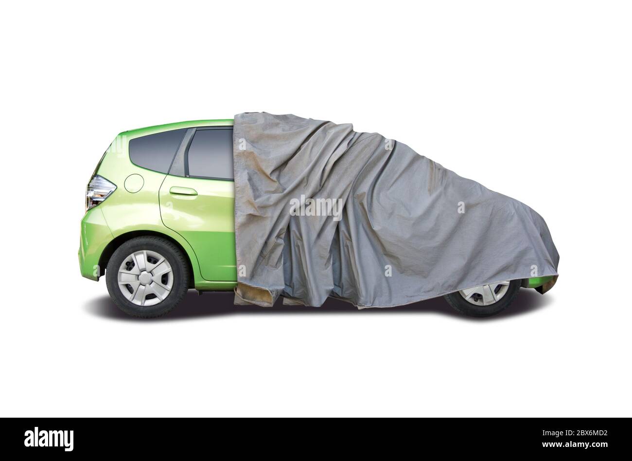 Car half covered isolated on white background Stock Photo