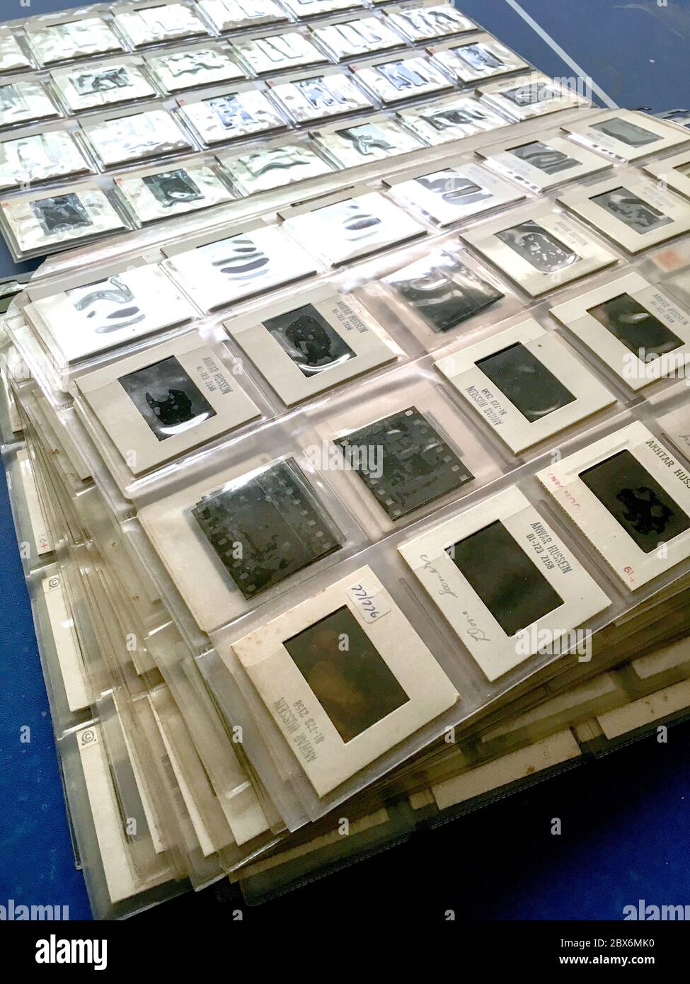 35mm colour photo transparencies stored and waiting for digital scanning.  Positive 35mm film made by Kodak, Fuji and others was a popular choice for  p Stock Photo - Alamy