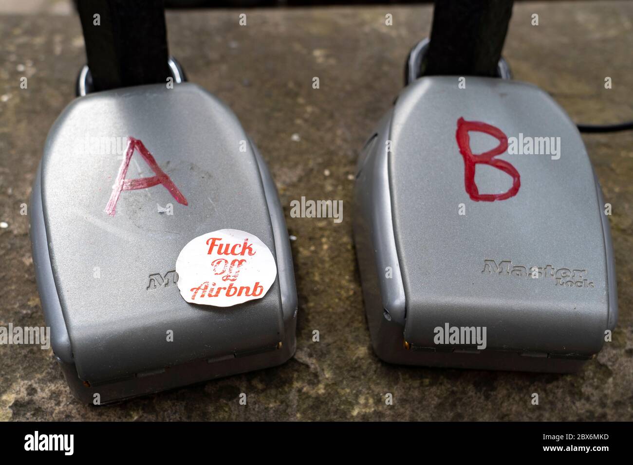 Detail of illegal typically AirbnB short term letting key safes in Old Town of Edinburgh, Scotland, UK Stock Photo