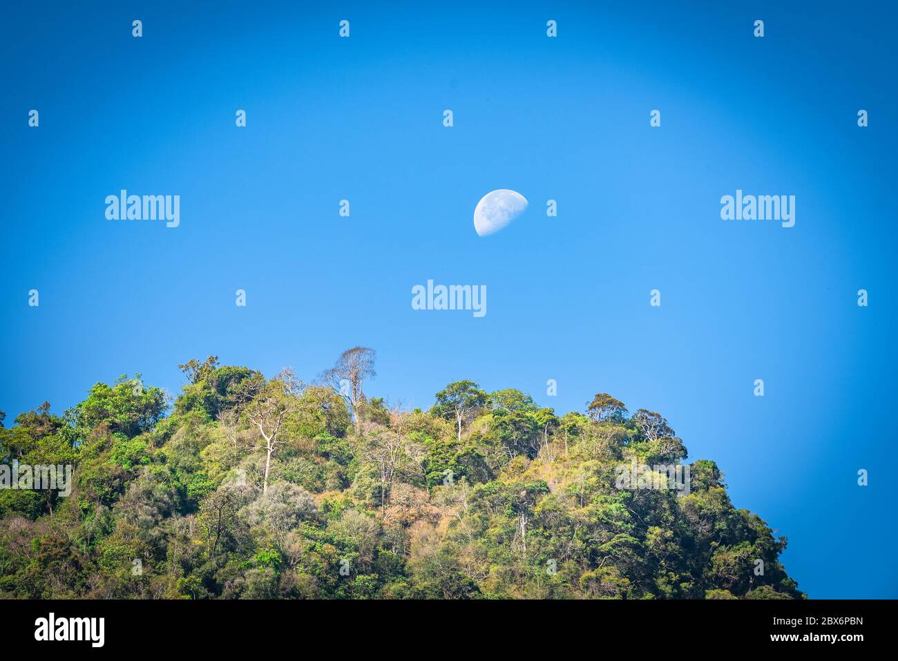 Moon on a mountain Thailand Stock Photo